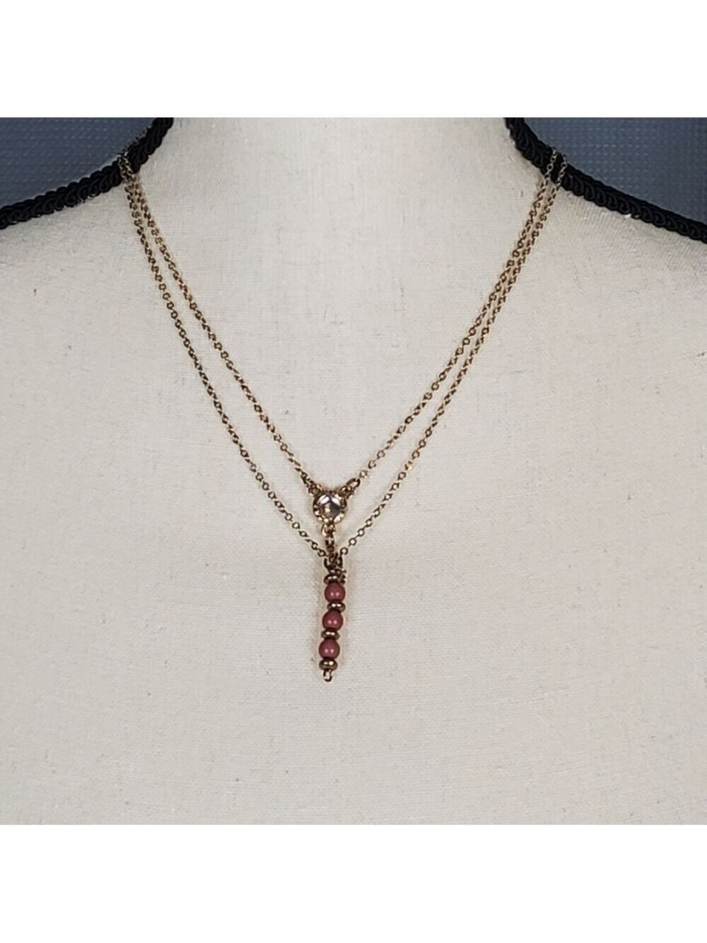 Necklace, gold toned with pink and clear beads
